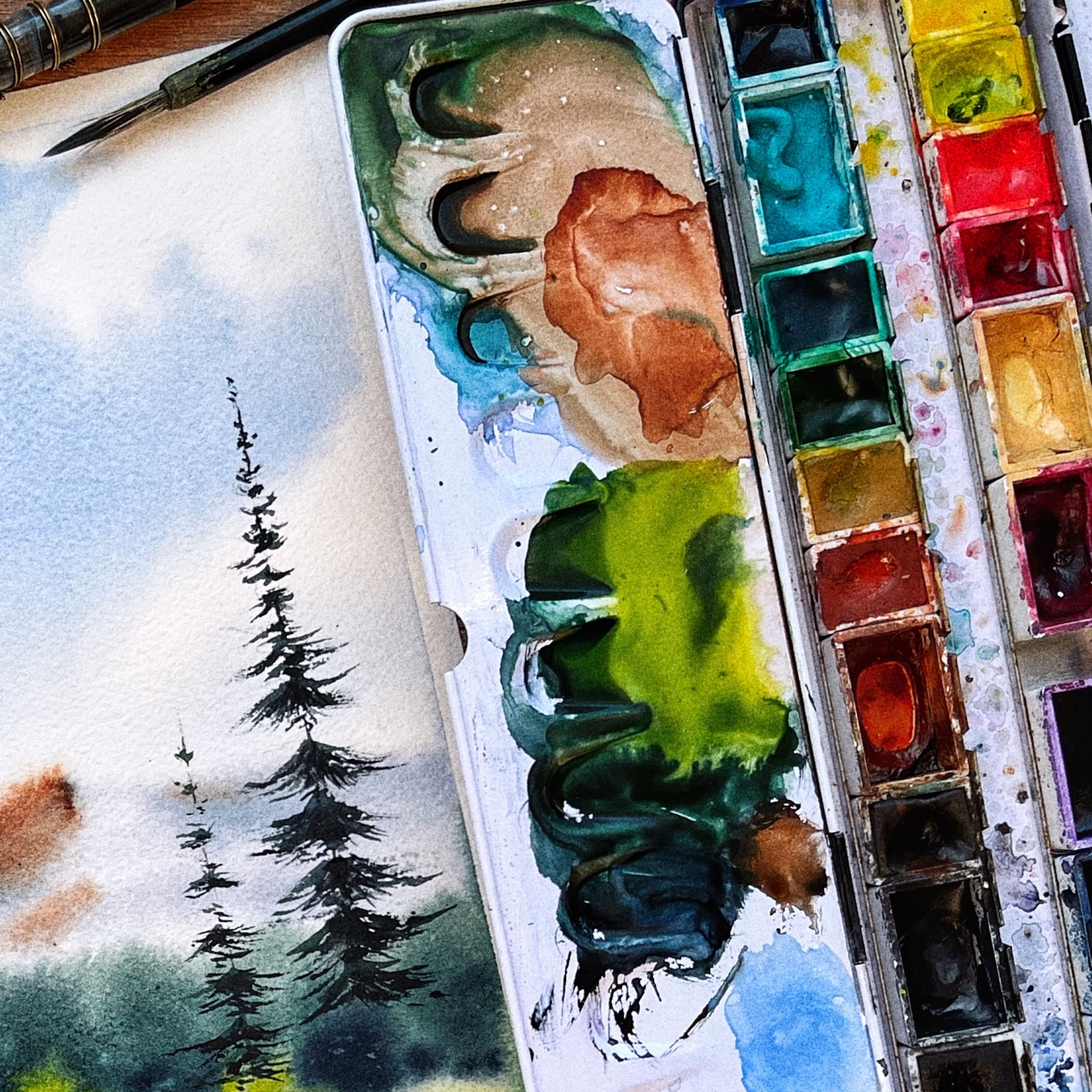 A landscape and a watercolor set
