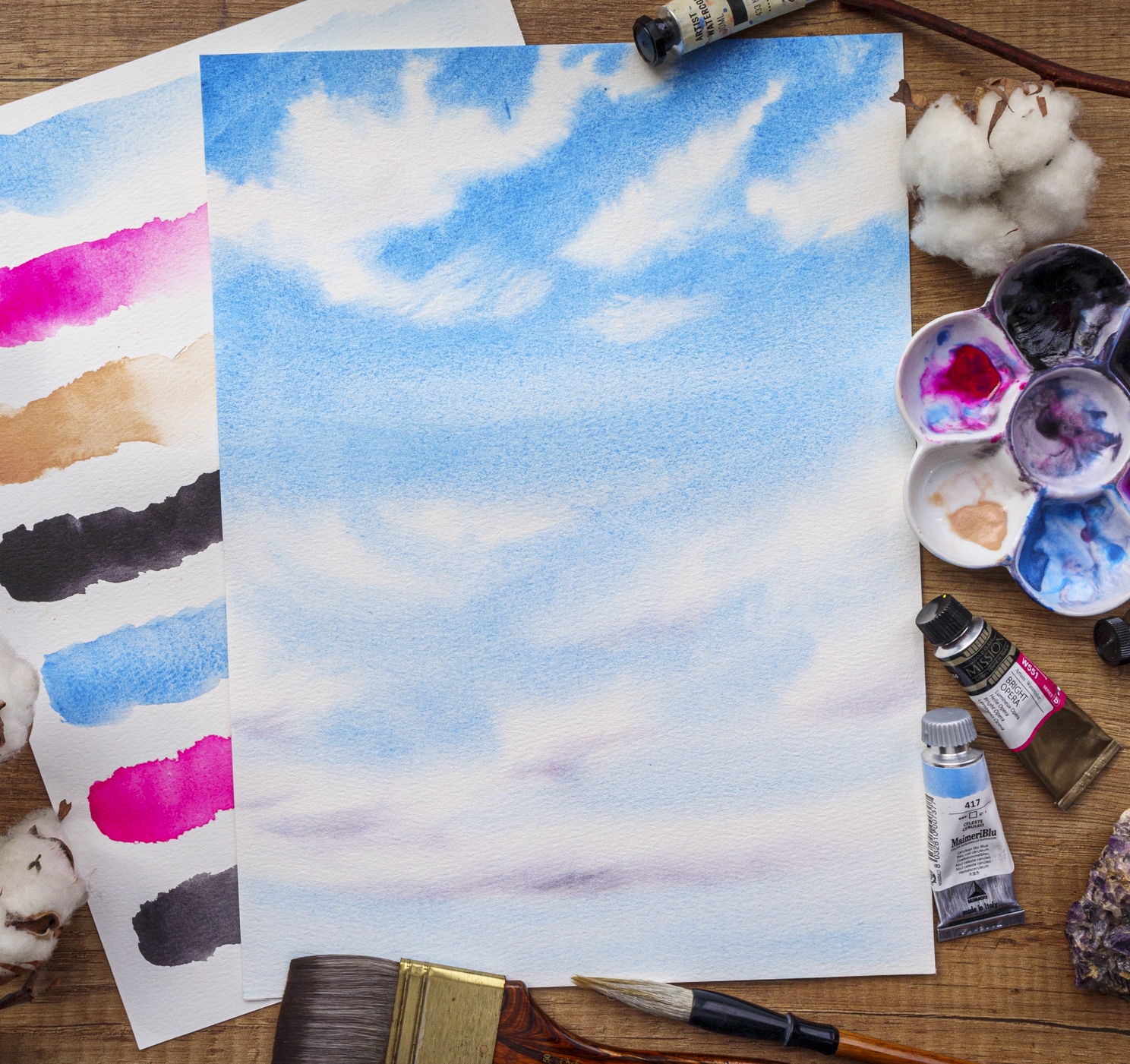Blue sky with soft clouds watercolor painting