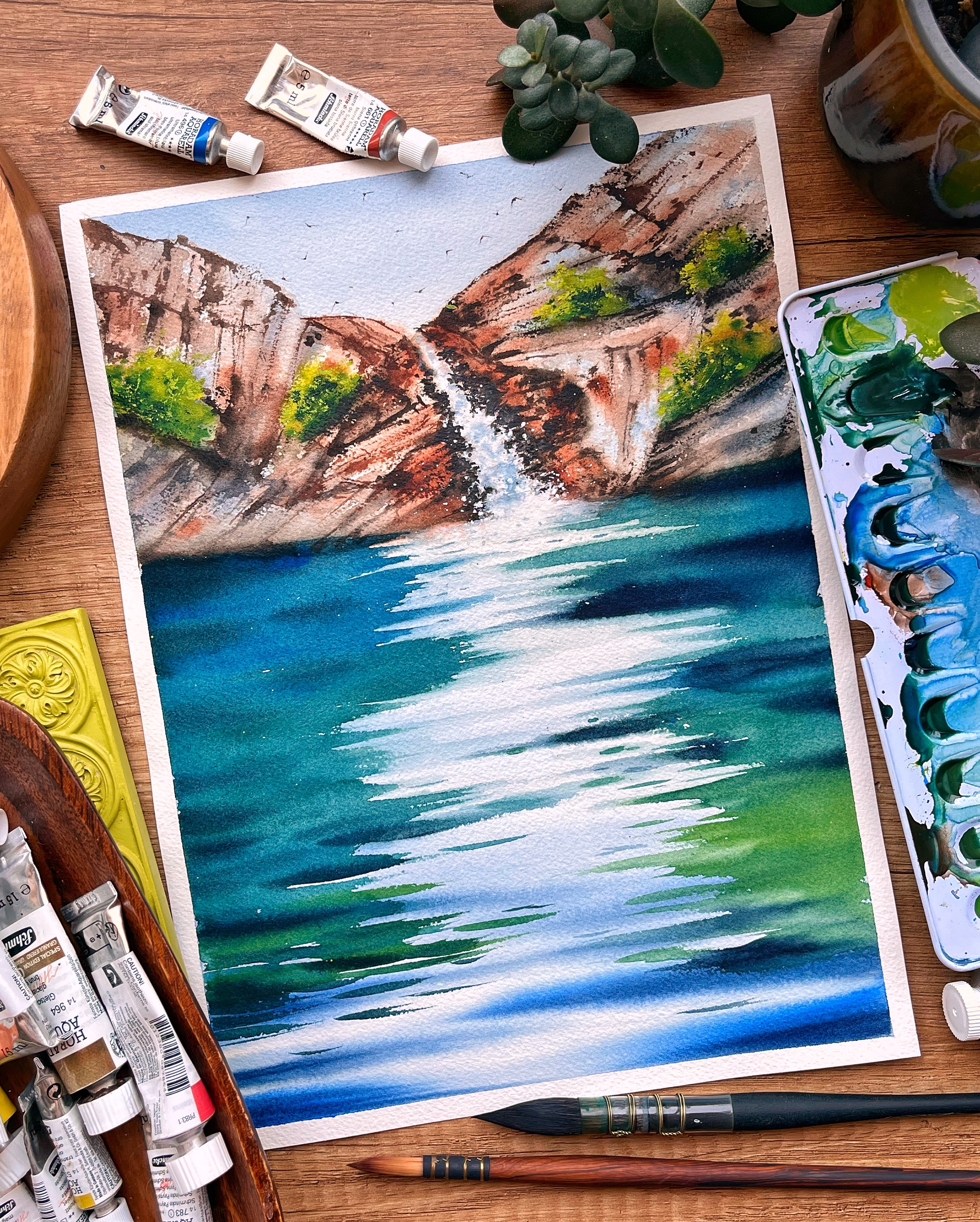 Fresh watercolor landscape of a waterfall