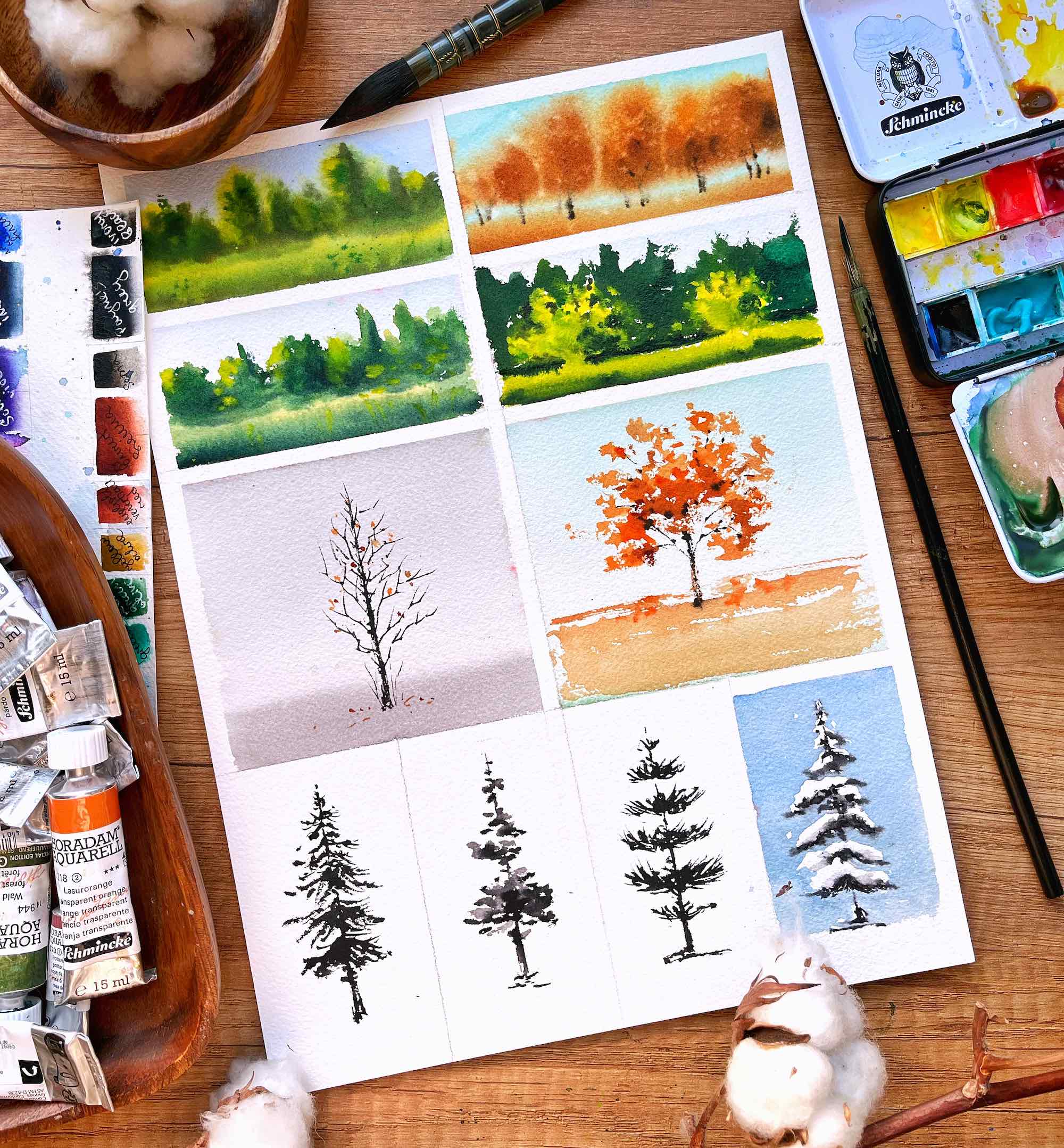 A watercolor painting showing different kinds of painted trees